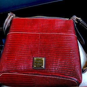 Dooney and Bourne red pebbled leather crossbody.